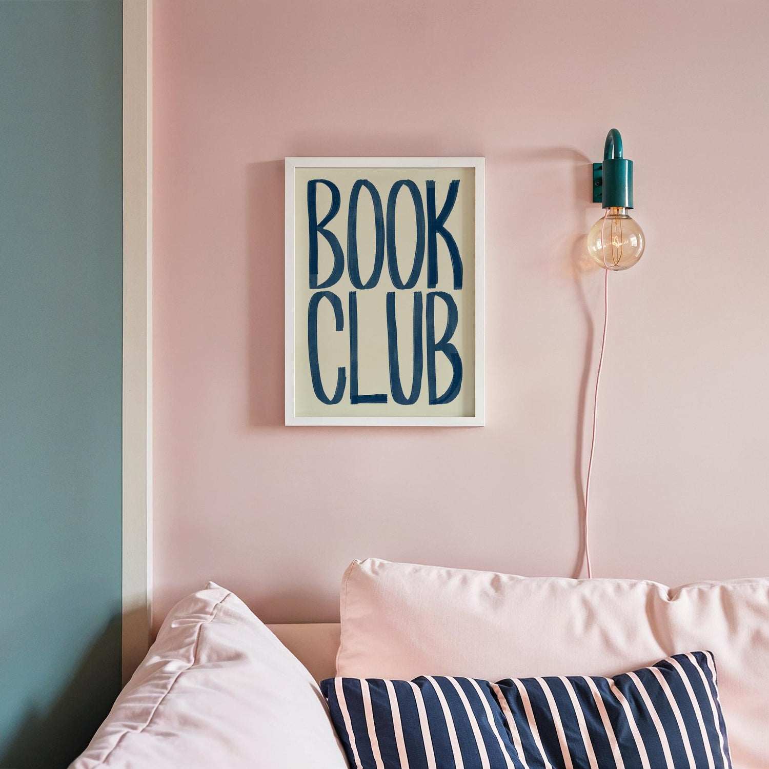 book club typography framed print on a pink wall