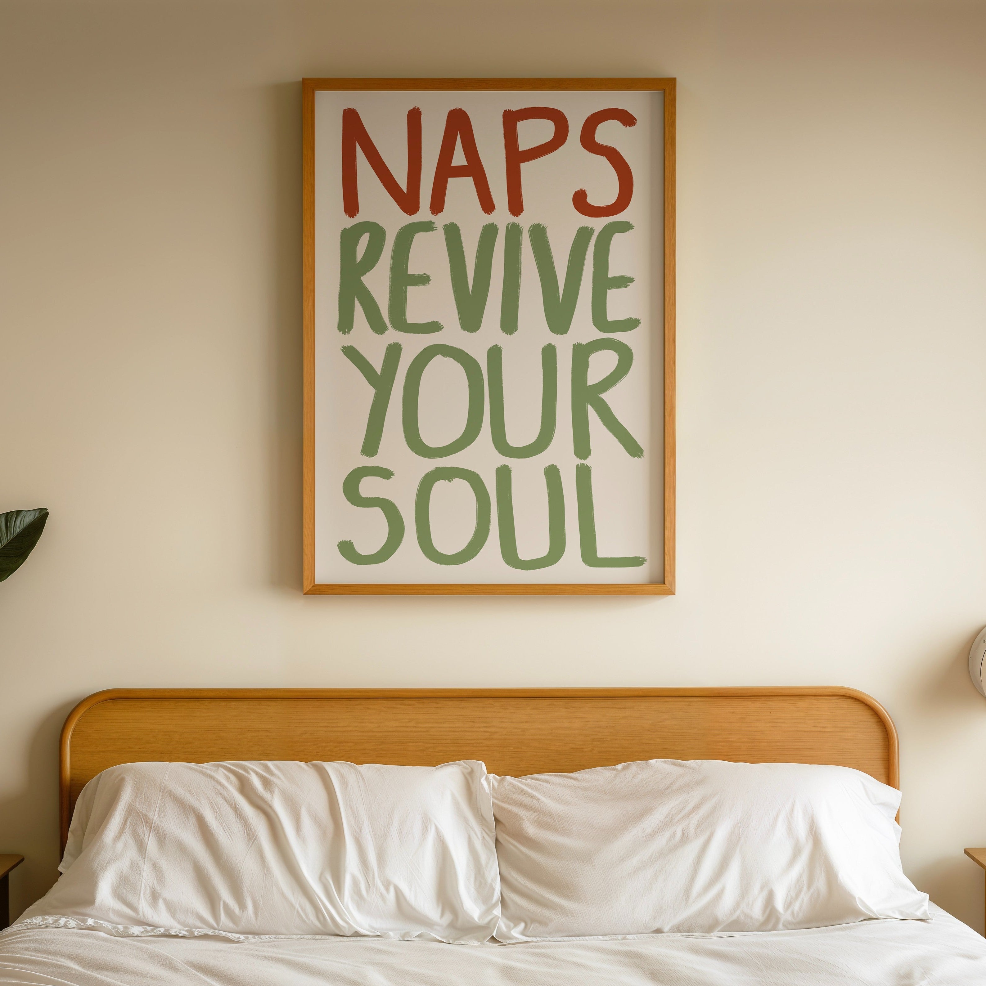 bedroom with framed naps revive your soul wall print on the wall